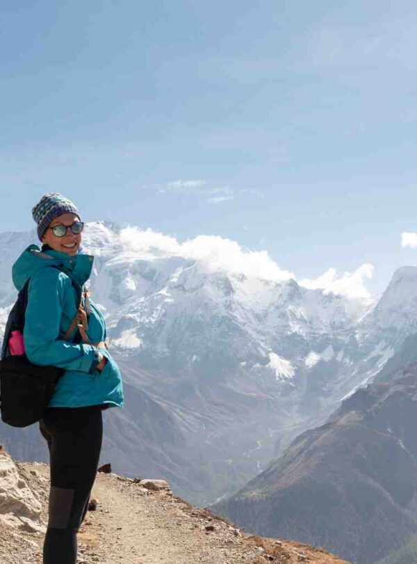 A woman hiking Annapurna Circuit Trek, Himalayas, Nepal.