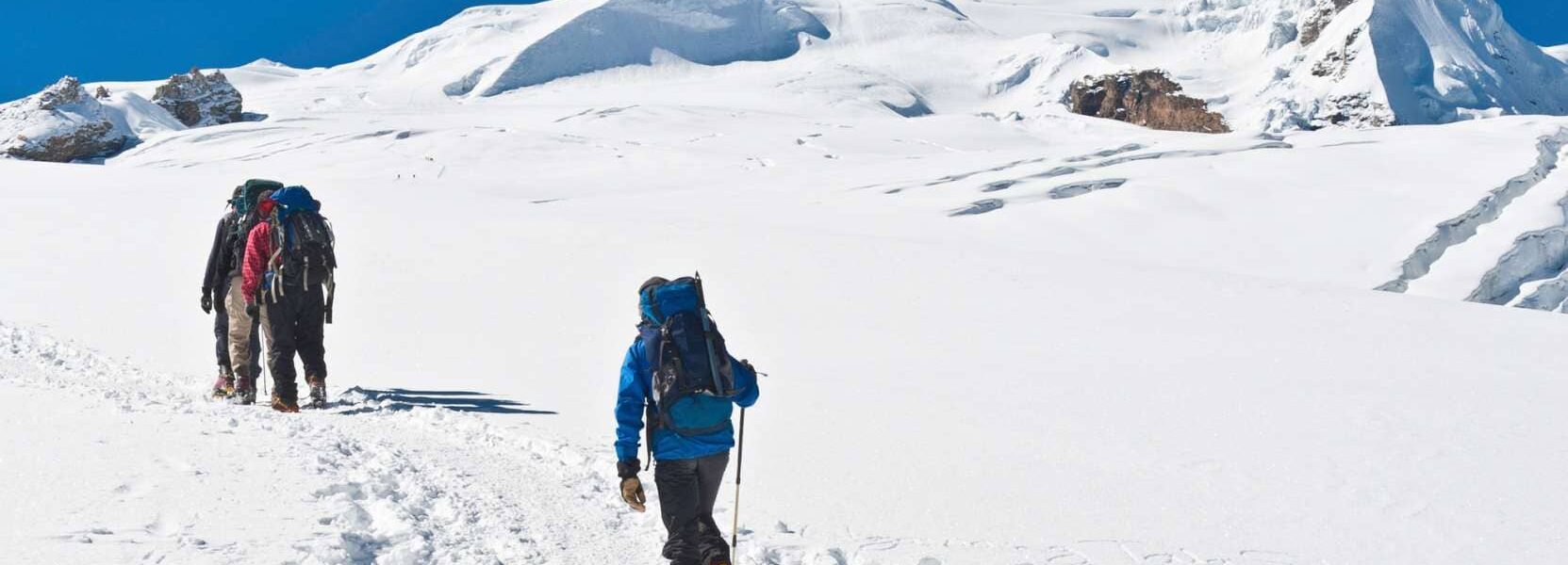 Mountaineers climbing snow summit Mera Peak Climbing